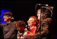 A group of people on stage

Description automatically generated