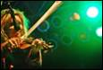 A person playing a violin

Description automatically generated