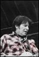 A person in a plaid shirt

Description automatically generated