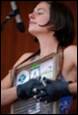 A person with a microphone

Description automatically generated