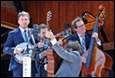 A group of people playing instruments

Description automatically generated