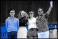A group of people posing for a photo

Description automatically generated