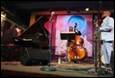 A person playing a piano on a stage

Description automatically generated with low confidence