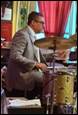 A person playing a drum set

Description automatically generated with medium confidence