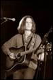 A person playing a guitar

Description automatically generated with medium confidence