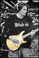 A person playing a guitar

Description automatically generated with medium confidence