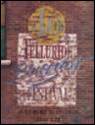 A sign on a brick wall

Description automatically generated with low confidence