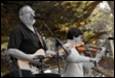 A group of people playing instruments

Description automatically generated with low confidence
