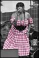 A person wearing a dress

Description automatically generated