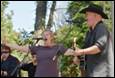 A group of people singing and playing instruments

Description automatically generated