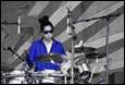 A person playing a drum set

Description automatically generated with medium confidence