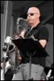 A person playing a saxophone

Description automatically generated with low confidence