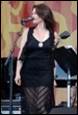 A person in a black dress

Description automatically generated with medium confidence