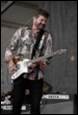 A person playing a guitar

Description automatically generated with medium confidence