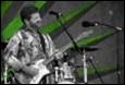A person playing a guitar

Description automatically generated with medium confidence