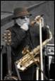 A person playing a saxophone

Description automatically generated with low confidence