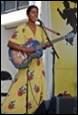 A person playing a guitar

Description automatically generated with medium confidence
