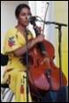 A person playing a cello

Description automatically generated with medium confidence