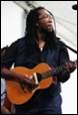 A person playing a guitar

Description automatically generated with medium confidence