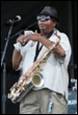 A person playing a saxophone

Description automatically generated with medium confidence