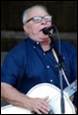 A person singing into a microphone

Description automatically generated with medium confidence