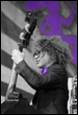 A person holding a guitar

Description automatically generated with medium confidence