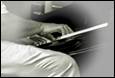 A close-up of a person playing a piano

Description automatically generated