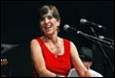 A person in a red dress

Description automatically generated with medium confidence
