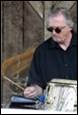 A picture containing music, person, clothing, musical instrument

Description automatically generated