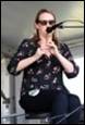 A person singing into a microphone

Description automatically generated with medium confidence