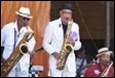 A group of men playing instruments

Description automatically generated with low confidence