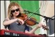A person playing a violin

Description automatically generated