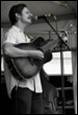 A person playing a guitar

Description automatically generated with low confidence