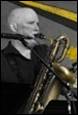 A person playing a saxophone

Description automatically generated with low confidence
