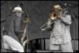 A group of men playing instruments

Description automatically generated with low confidence