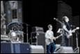 A group of people playing instruments

Description automatically generated with medium confidence