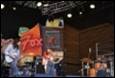 A picture containing drum, concert, stage equipment, person

Description automatically generated