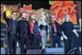 A group of people on a stage

Description automatically generated