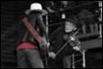 A picture containing clothing, person, concert, human face

Description automatically generated
