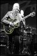 A person playing a guitar

Description automatically generated with medium confidence