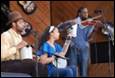 A group of people playing instruments

Description automatically generated