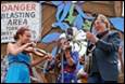 A group of people playing instruments

Description automatically generated
