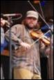 A person playing a violin

Description automatically generated