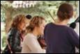 A group of women playing music

Description automatically generated