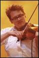 A person playing a violin

Description automatically generated