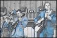 A group of men playing instruments

Description automatically generated