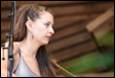A person with long hair

Description automatically generated