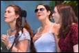 A group of women singing

Description automatically generated