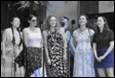 A group of women standing together

Description automatically generated