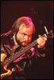 A person playing a guitar

Description automatically generated with medium confidence